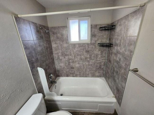 Building Photo - 2-Bedroom Townhome with Fenced Backyard and Modern Updates! |Utilities Included!