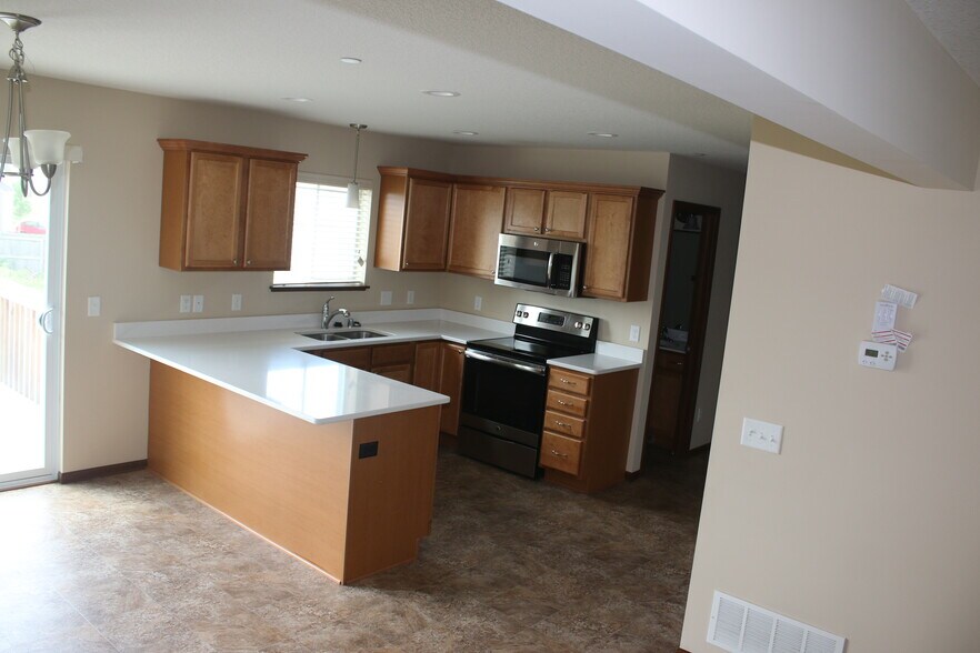 Kitchen (LvRm view) - 5178 Foxfield Dr NW