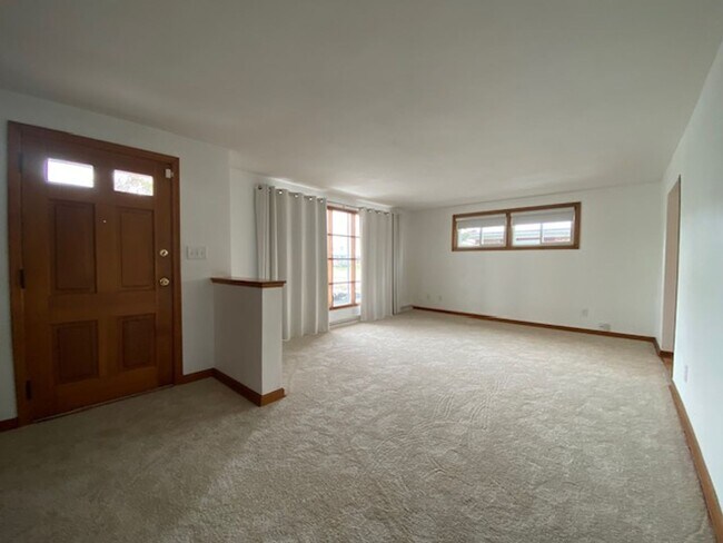 Building Photo - Welcome to this charming three-bedroom, tw...