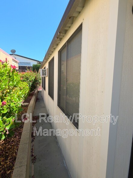 Building Photo - 30715 Arenga Palm Dr