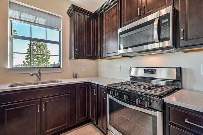 Building Photo - **Coach Home w/ Private Pool in Esplanade Lake Club **