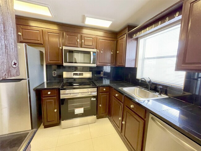 Building Photo - 5090 SW 64th Ave