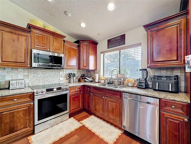 Building Photo - 8060 NW 51st Ct