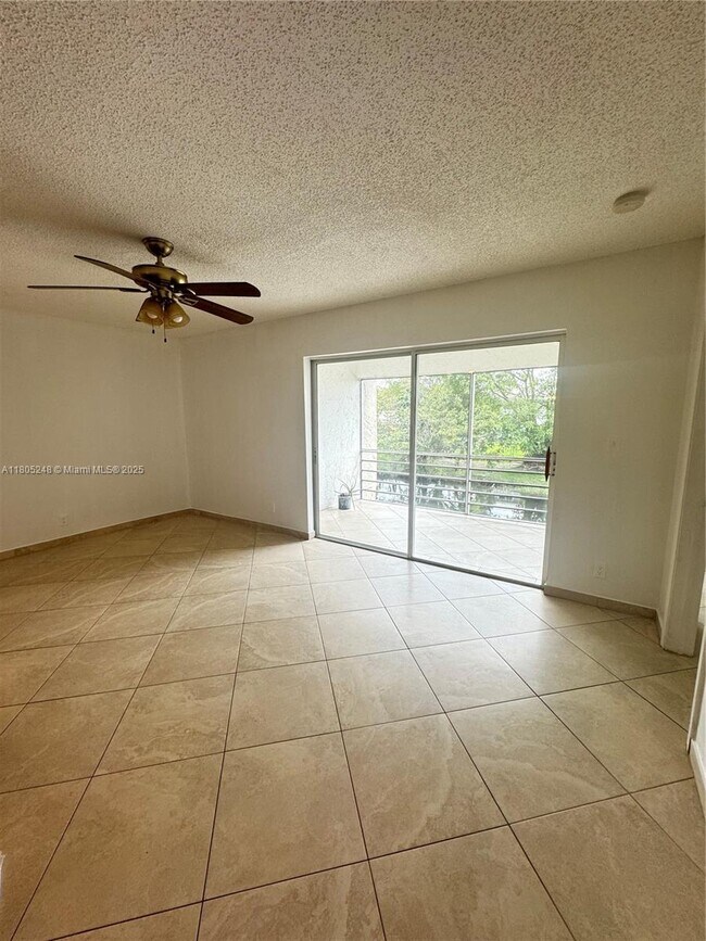 Building Photo - 3111 Coral Springs Dr