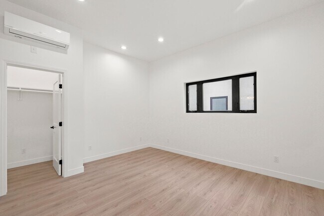 Building Photo - Stunning brand new construction, modern lu...