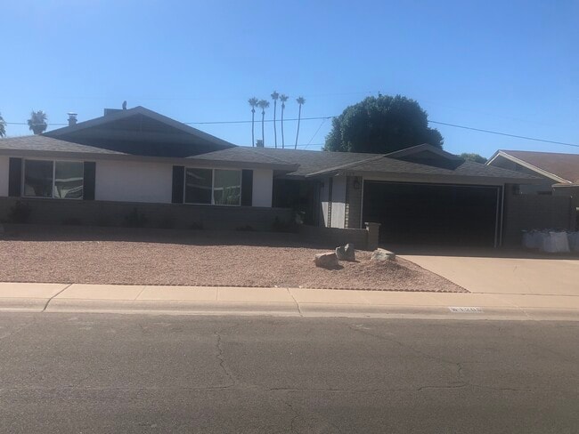 House Front - 1209 E Campus Dr