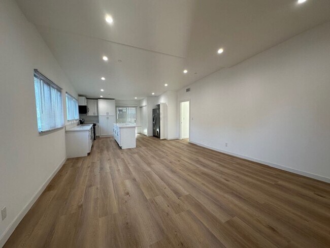 Building Photo - Completely remodeled 4+2 sprawled across a...