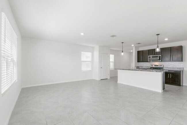 Building Photo - LIKE3 NEW Home For Rent in Avalon Park West!