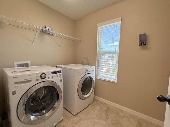 Building Photo - Spacious 4-Bedroom Retreat with additional office/den in the Heart of Trinity!