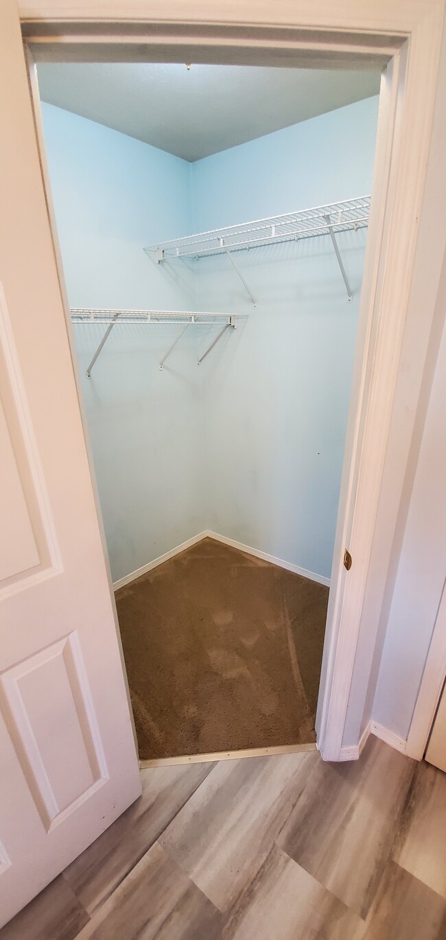 Walk in his and hers closets NOW with laminate flooring - 4960 W Tarkio St