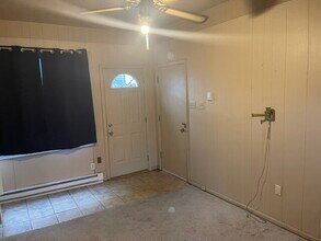 Building Photo - Spacious 2-Bedroom Home with Fireplace, Bonus Room, Fenced Yard & Garage