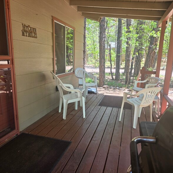 Cabin 7 Porch - 165 E White Mountain Blvd