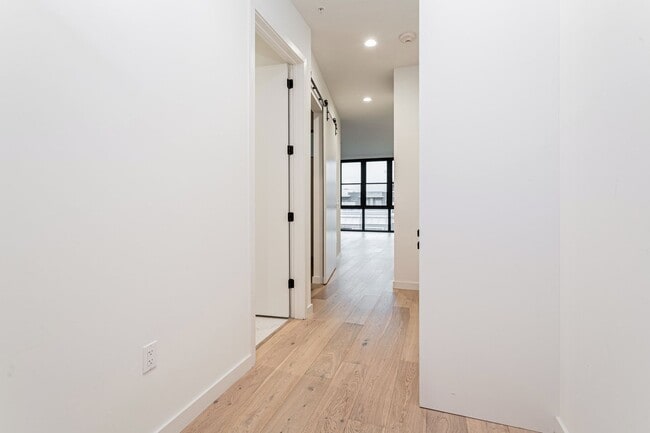 Building Photo - Light-Filled 2 Bed / 1 Bath – Wide-Plank Hardwood & W/D Included