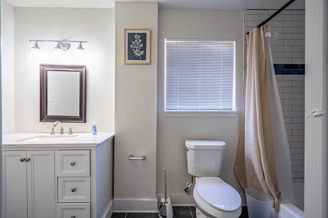 Building Photo - The Forest Haven | Large Forest Haven home with a spacious yard and deck, conveniently located ju...