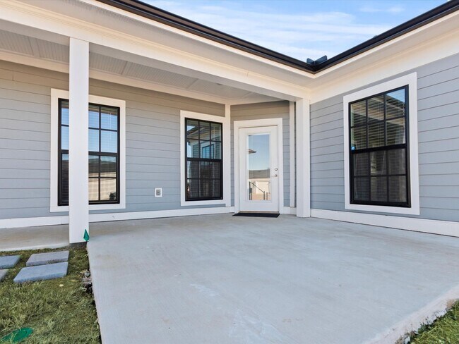 Building Photo - 3 Car Garage! Modern end-unit townhome located in the desirable Clift Farm!