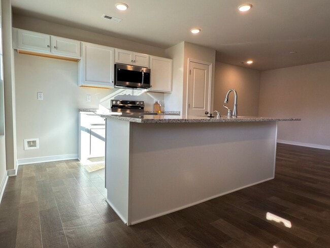 Building Photo - Modern New 3BR Townhome in Hancock Village with Luxury Finishes