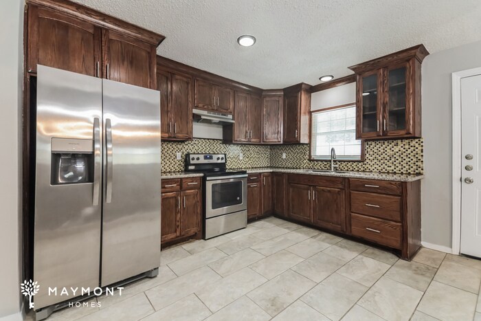 Building Photo - 6205 Magnolia Ln