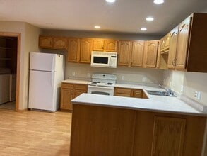 Building Photo - 2 Bed 2 Bath Twinhome with double attached garage SORRY NO PETS!!