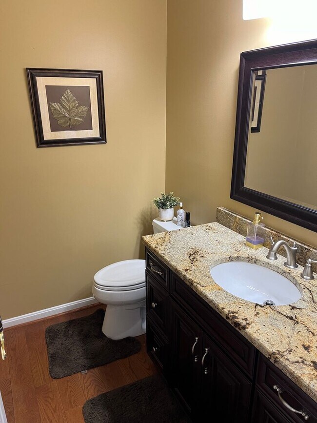 Building Photo - Updated & Landscaped 4 Bedroom, 4 Bath Hom...