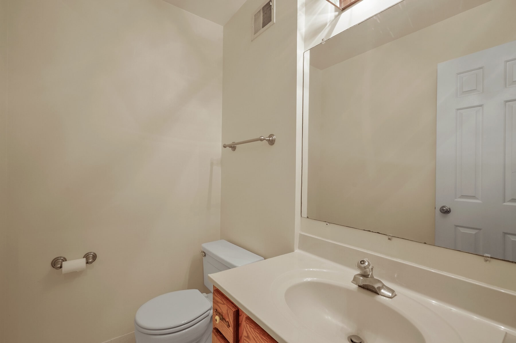 Vanity and commode 1st floor powder room - 1140 N Taylor St