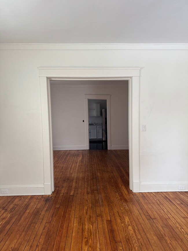 Front Living Space Looking into Middle Living Space - 7415 Goodwalt Ave