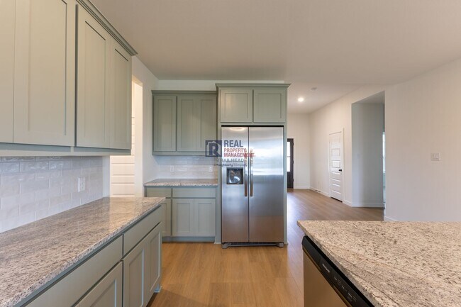 Building Photo - Beautiful 4 Bedroom Home with Covered Patio & Hill Country Views