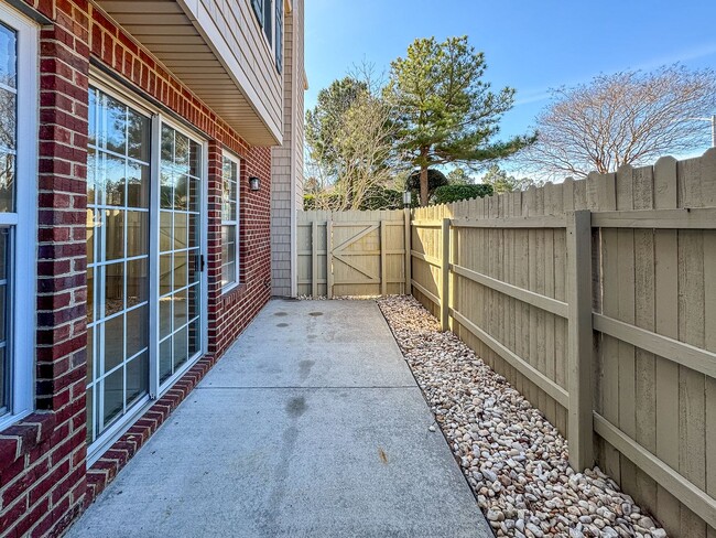 Building Photo - Introducing a charming 2-story corner unit...