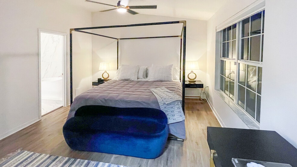 Master Bedroom with King Canopy Bed, Ensuite Bathroom and Walk-In Closet - 2034 Strathmill Dr