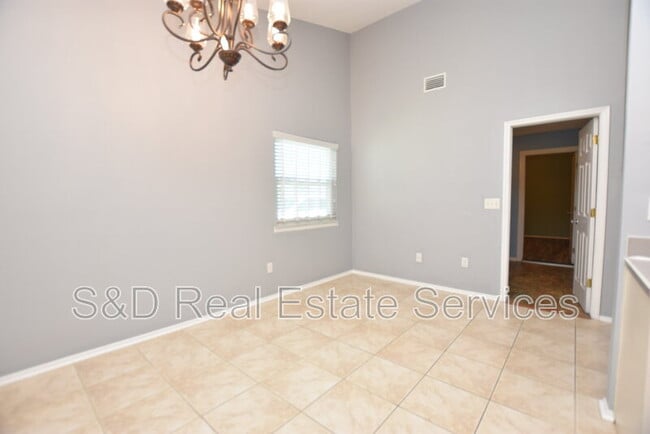 Building Photo - 8212 Riverboat Dr