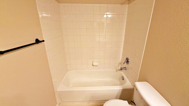 Building Photo - NEW CARPET NEW PAINT!! Clean and Bright 2BR 2BTH Condo Close To DIA. Gated Community in First Cre...