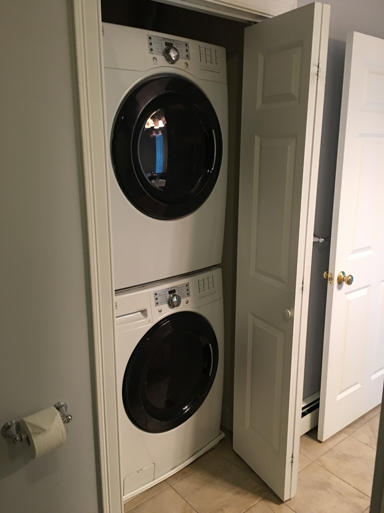 Stacked washer and dryer in master bath closet - 14 Heron Cove Dr