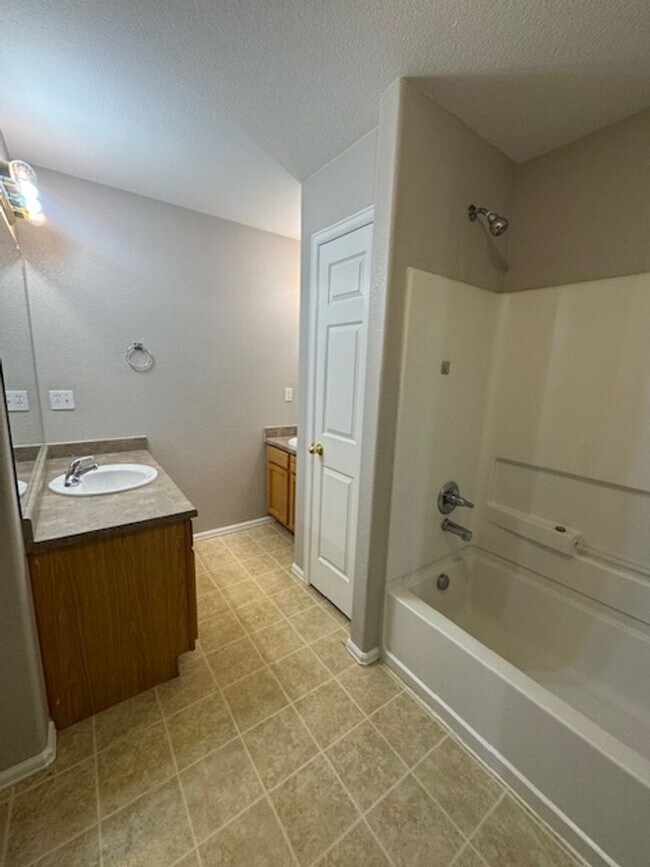 Building Photo - Charming 3BD Townhome in Gated Community just minutes from Peterson AFB & Fort Carson - Security ...