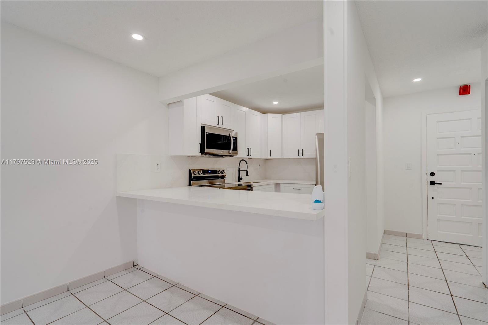 Building Photo - 6095 W 18th Ave