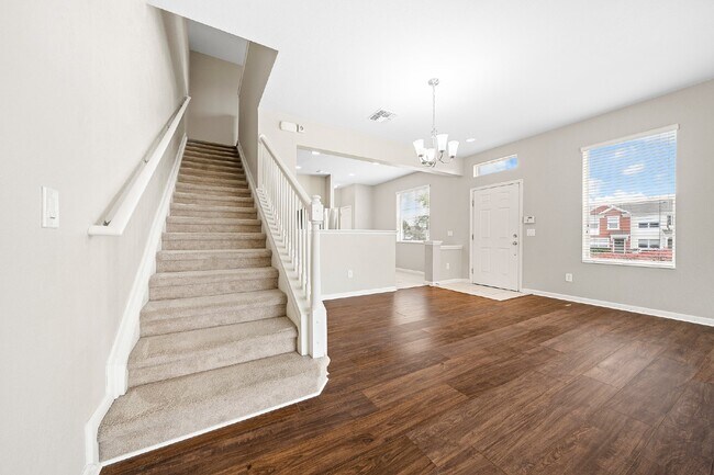 Building Photo - Corner Unit ~ Lake View ~ Maintenance Free...