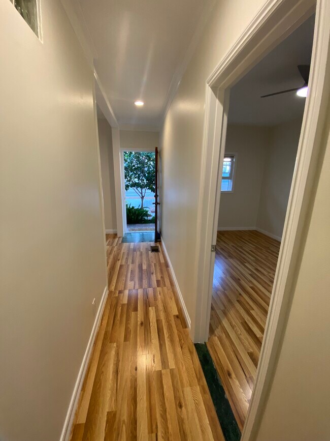 View from the end of the hallway to front door and patio courtyard - 815 14th St