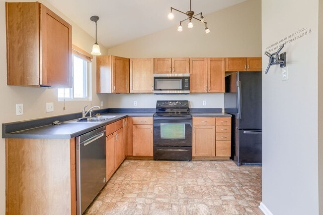 Building Photo - Charming Multi-Level Near Parks and Lakes!!
