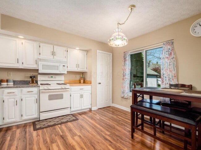 Building Photo - 6985 Muirfield Dr