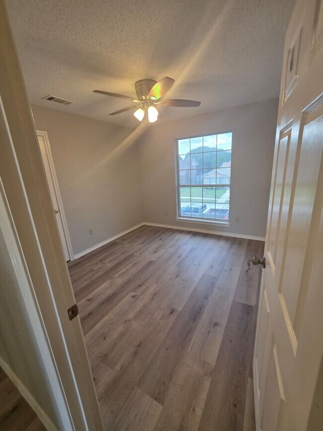 Building Photo - Spacious 4-Bedroom Home with Pool & Spa in...