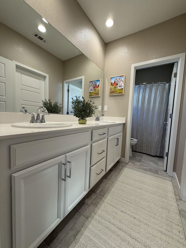 Building Photo - Stunning 3 bedroom and 2.5 bathroom home in McKinley Village!