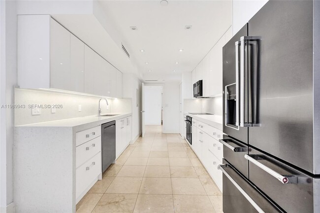 Building Photo - 10175 Collins Ave