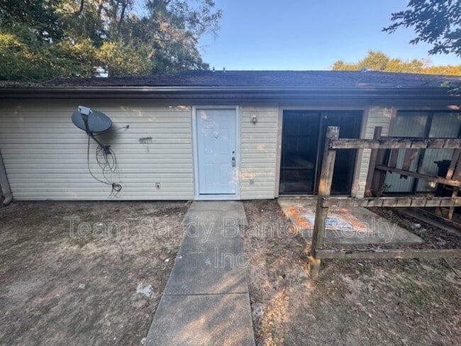 Building Photo - 6823 Tiki Ln