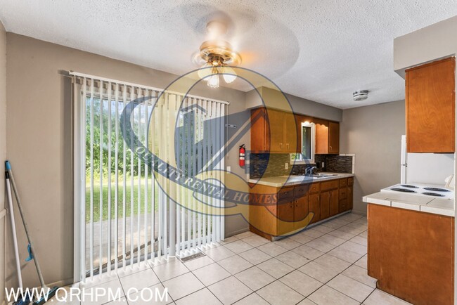 Building Photo - Available Now! Carmen Ainsworth Schools - Water included - SIDE BY SIDE DUPLEX