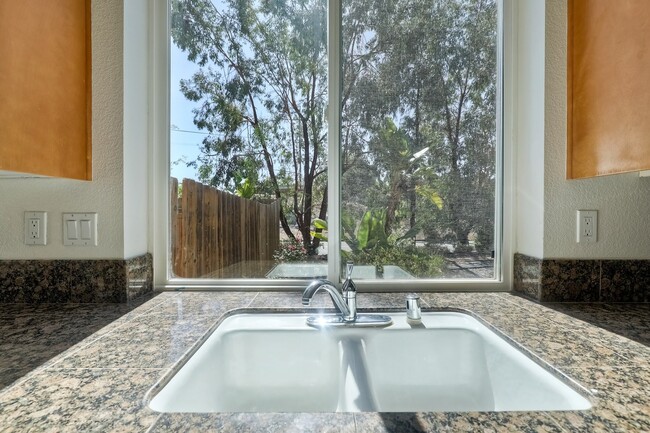 Building Photo - Charming 1-Story Corner Lot Home with Great Room & Patio