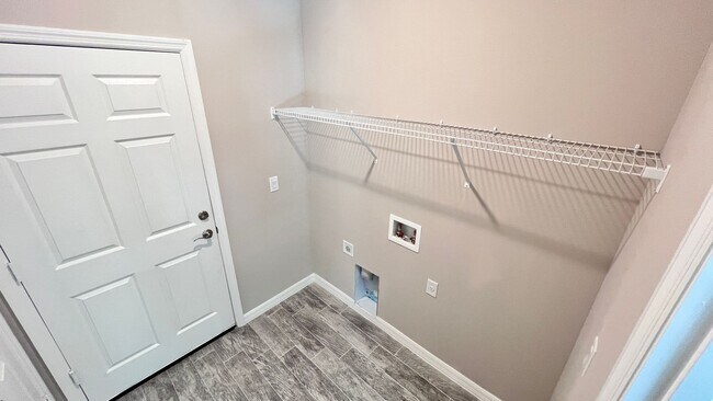Building Photo - Spacious 3-Bedroom Home with Garage & Pati...