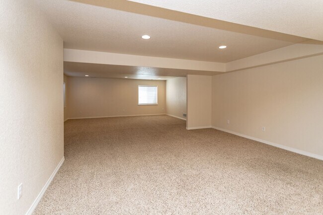 Building Photo - Spacious 5-Bedroom Home with Finished Base...