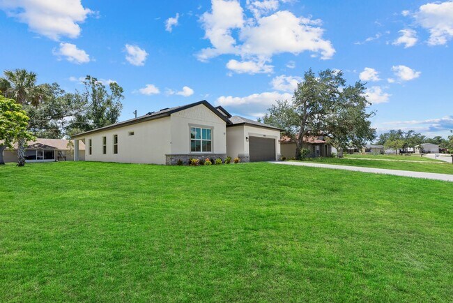 Building Photo - Spacious 4/3 Brand NEW Construction Home O...