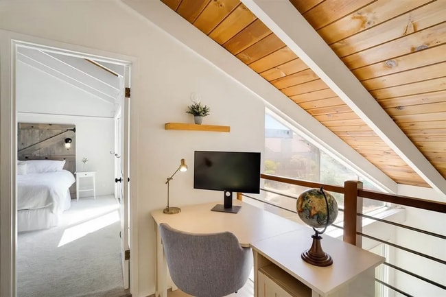 Building Photo - Spacious 1,550 Sq Ft Townhome | 2-Car Garage & High Ceilings w/ Exposed Beams