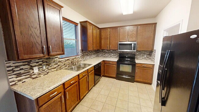 Building Photo - "Spacious 4-Bedroom Gem with 2.5 Baths and...