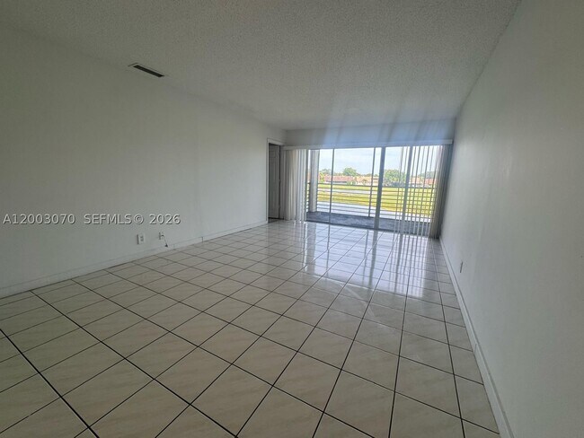 Building Photo - 7410 Woodmont Terrace