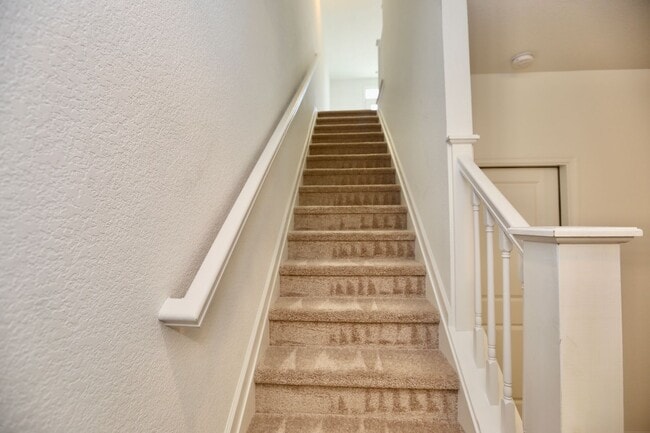 Building Photo - 3 Bedroom Townhome in Spence Crossing! Water/Sewer/Trash/Landscaping INCLUDED! - Attached Garage ...